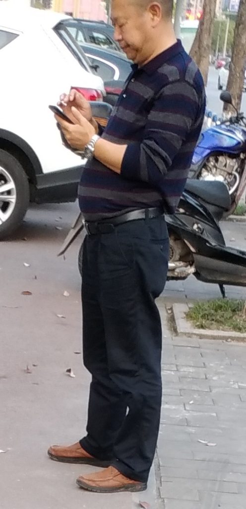 中年polo衫皮带皮鞋西裤